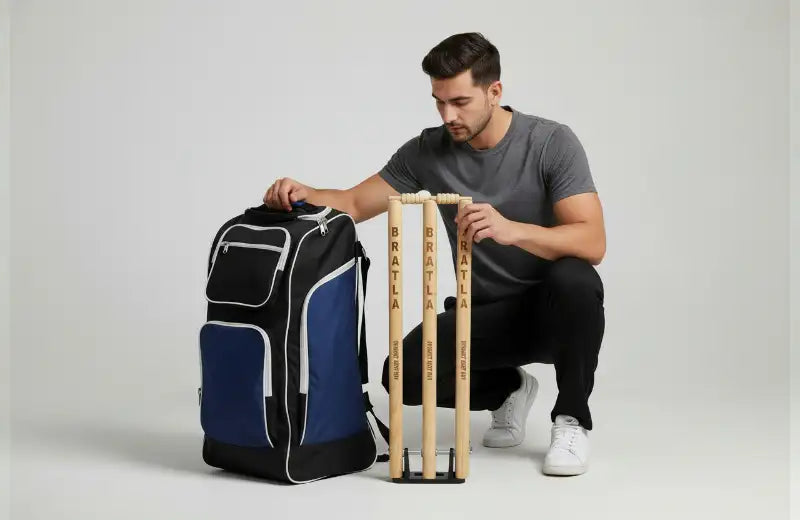 Black and blue bratla cricket gear backpack with white trim.
